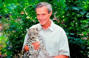 George Schaller with snow leopard cub. Photo by WCS.